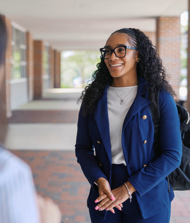 female student dressed in business professional wear
